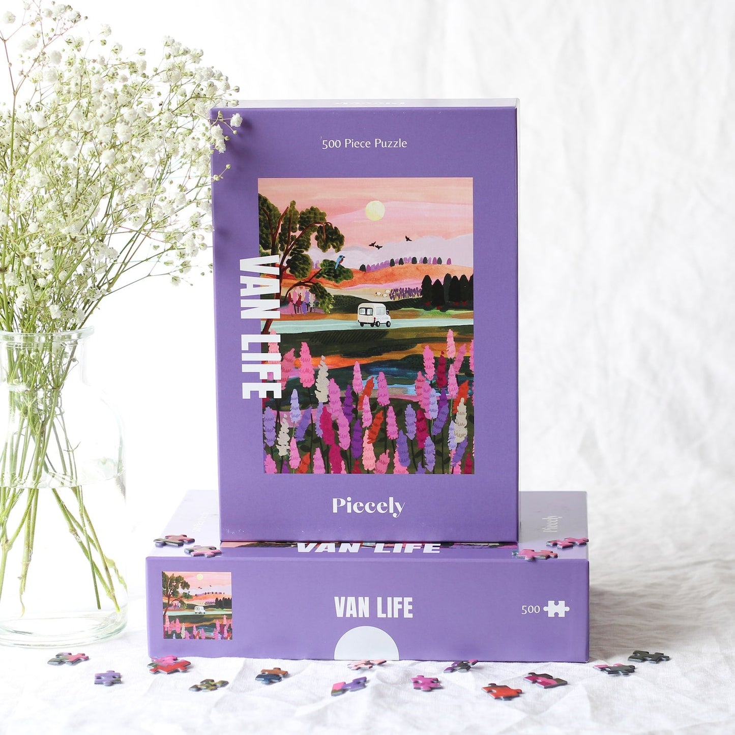 Außergewöhnliches 500-Teile-Puzzle für Erwachsene, das einen Van zeigt, der durch die herbstliche Landschaft Neuseelands fährt.