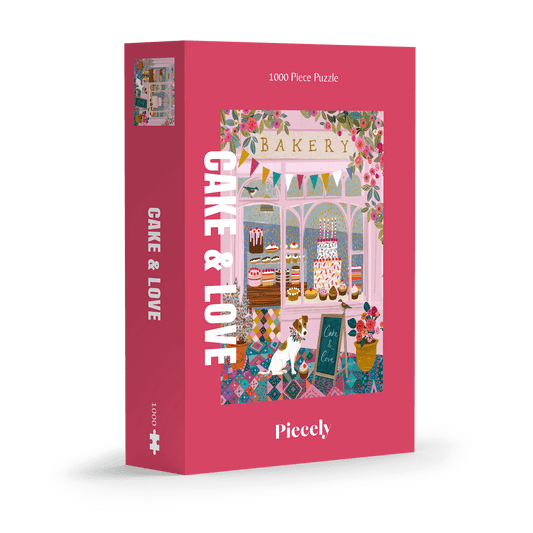 Außergewöhnliches 1000-Teile-Puzzle für Erwachsene, das eine rosa Bäckerei mit Torten, Kuchen und Cupcakes im Schaufenster und einen kleinen Hund für der Tür zeigt.