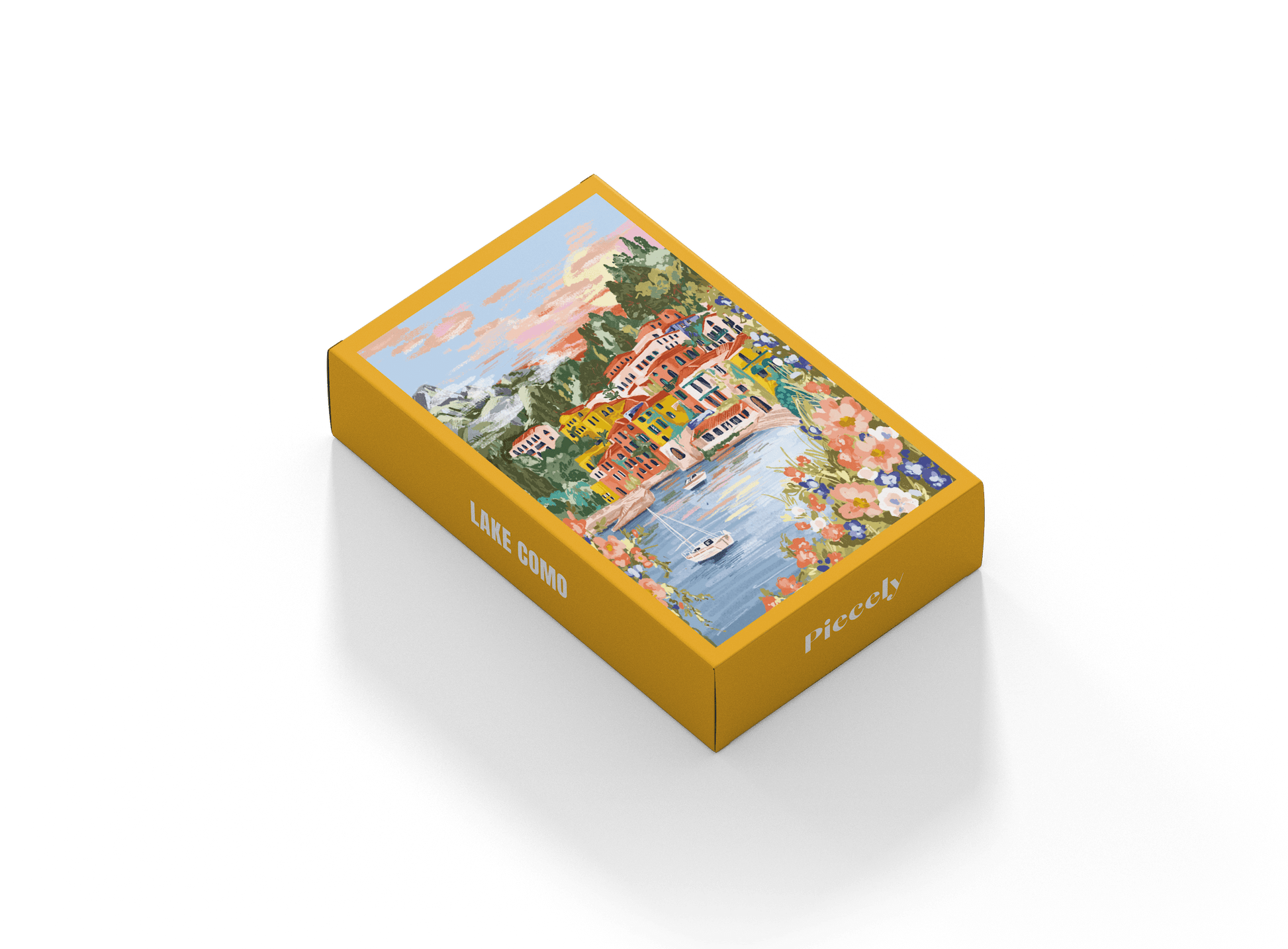 99-teiliges Minipuzzle für Erwachsene, das den Comer See in Varenna zeigt. In der Bucht befinden sich zwei Boote und die Sicht auf den See ist gesäumt von bunten Häusern.