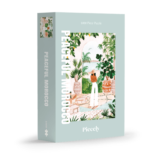 Außergewöhnliches Puzzle für Erwachsene mit einer Illustration von einer Frau in Marokko umgeben von Meer, tropischen Pflanzen und Zitronen.