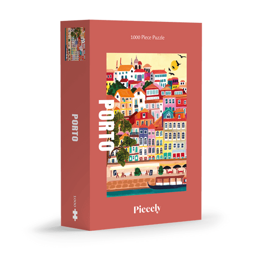 1000-teiliges Puzzle für Erwachsene, dass die bunten Häuser Portos am Wasser zeigt.